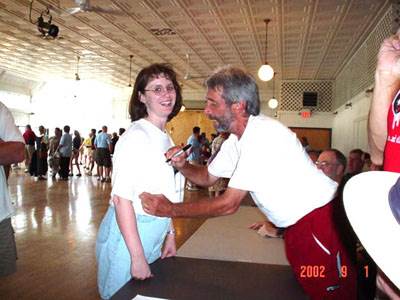 Larry signing autographs